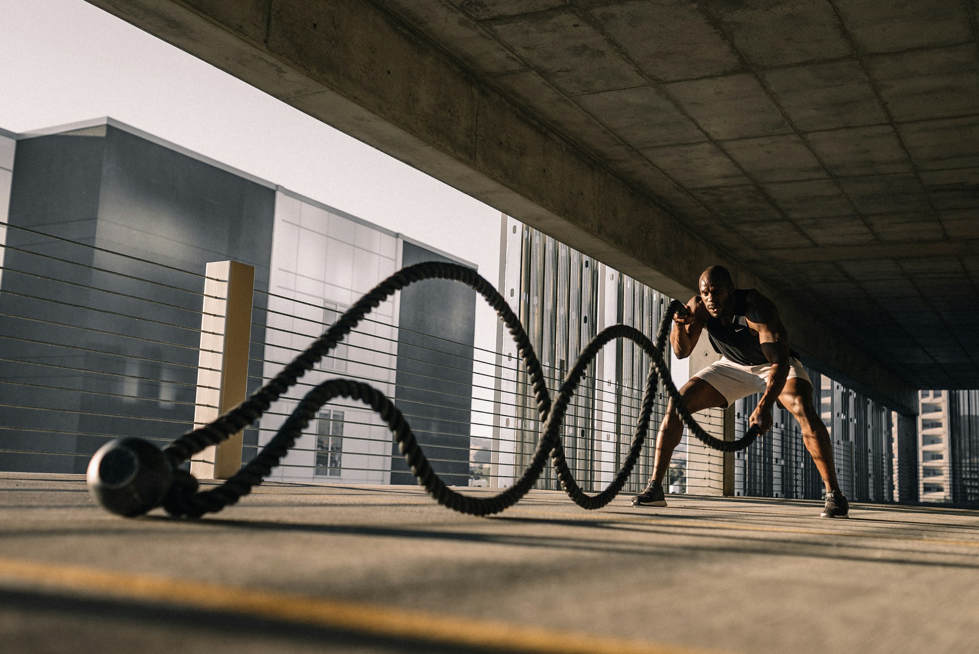 Athlete training at home with programming on a tablet